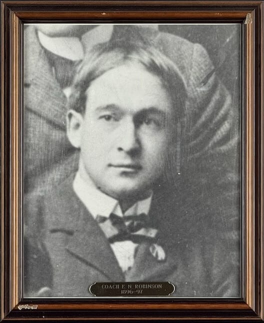 Black-and-white portrait of E.N. Robinson in a dark suit and bow tie.
