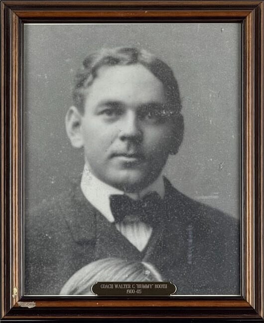 Black-and-white portrait of Walter C. Booth in a dark suit and bow tie.